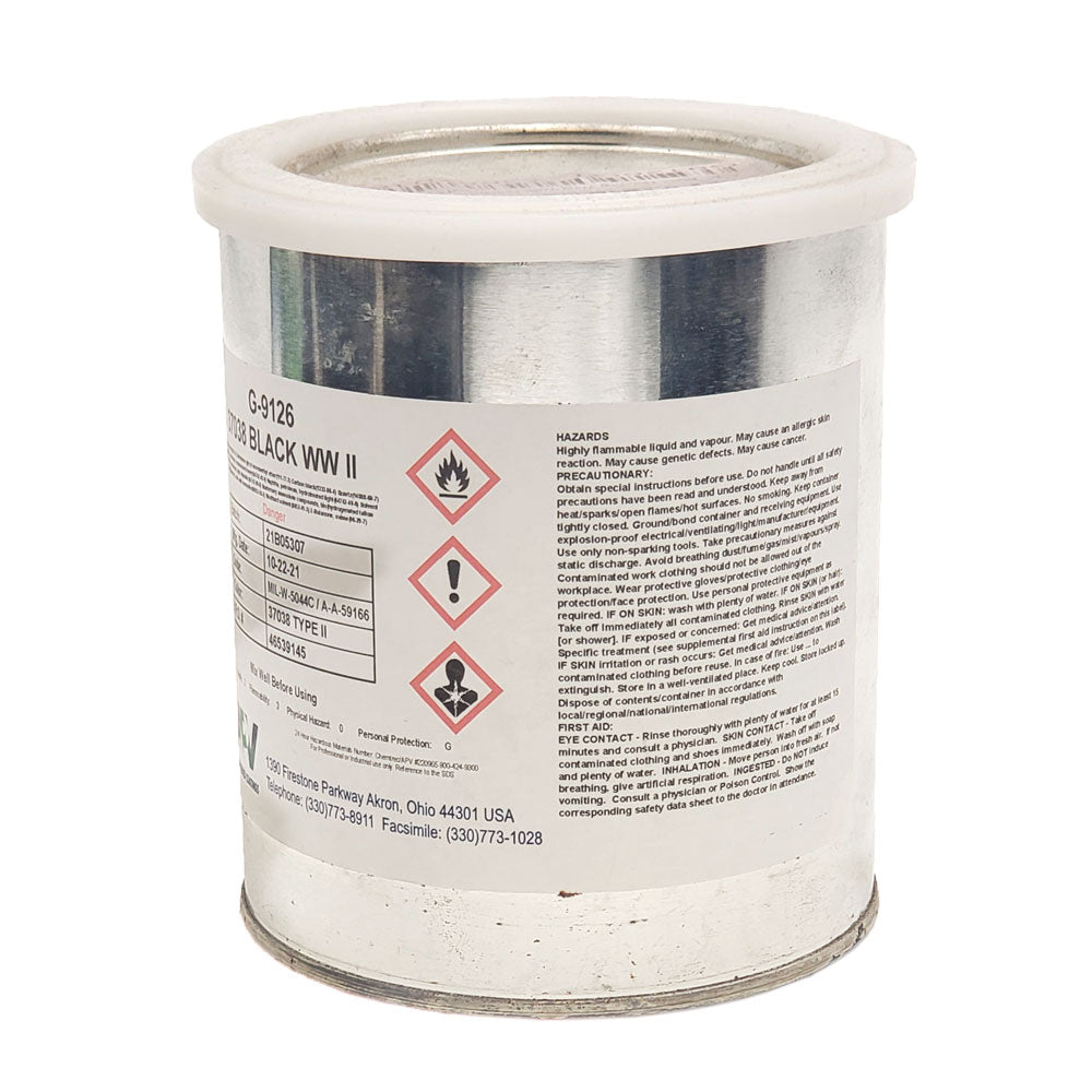 Safety label on AVP black non-slip wing walk compound showing GHS hazard symbols, flammable liquid warnings, health risks, and first-aid instructions