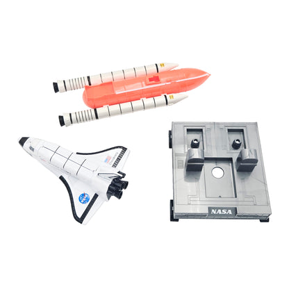 Close-up of toy Space Shuttle Discovery with NASA logo, United States text, and American flag decals