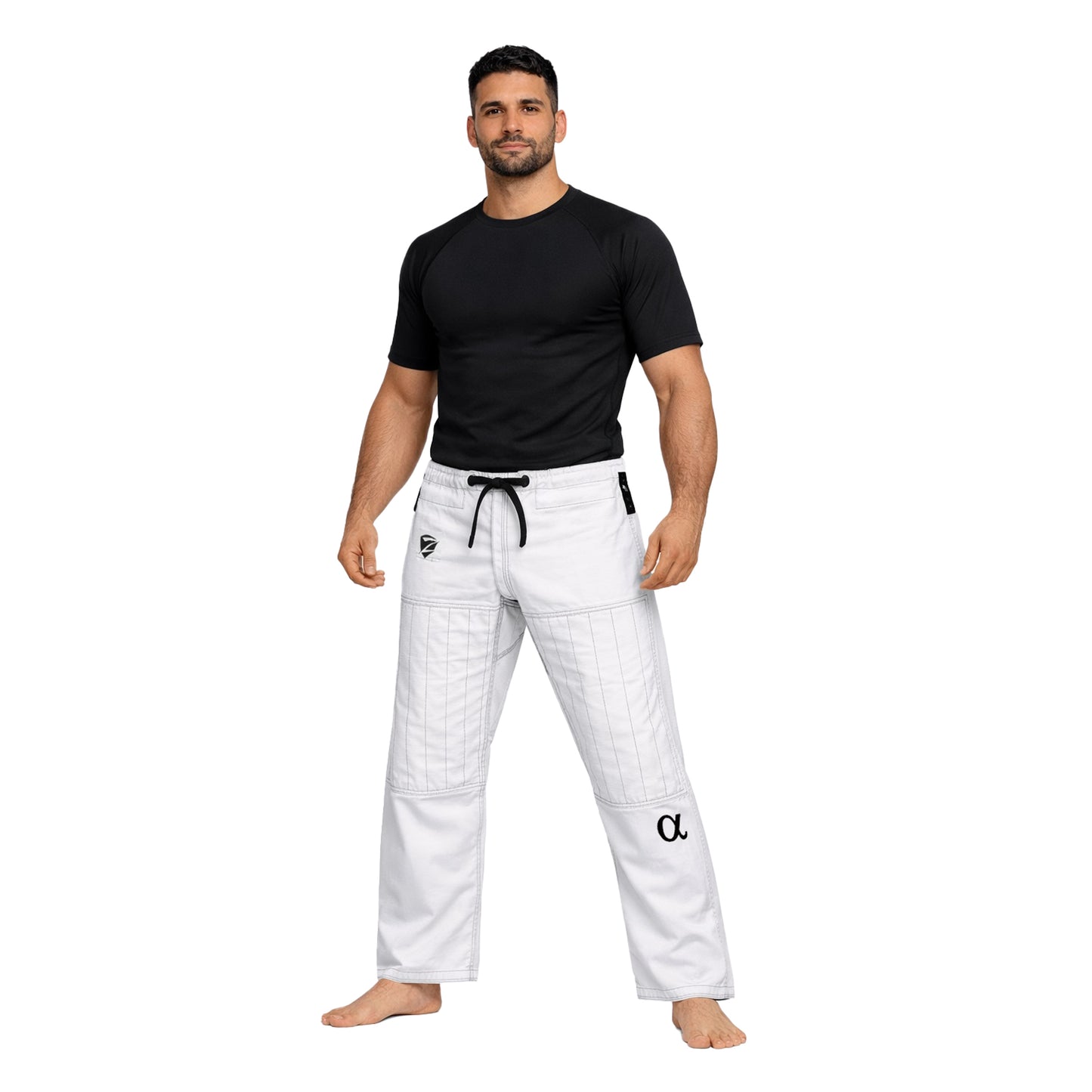 Man wearing a black t-shirt and white pants with a brand logo on a white background