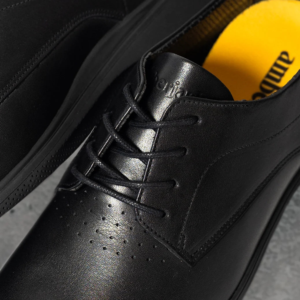 Amberjack The Original Obsidian black pilot dress oxford shoe, left side view, TSA-compliant lace-up | Close Up