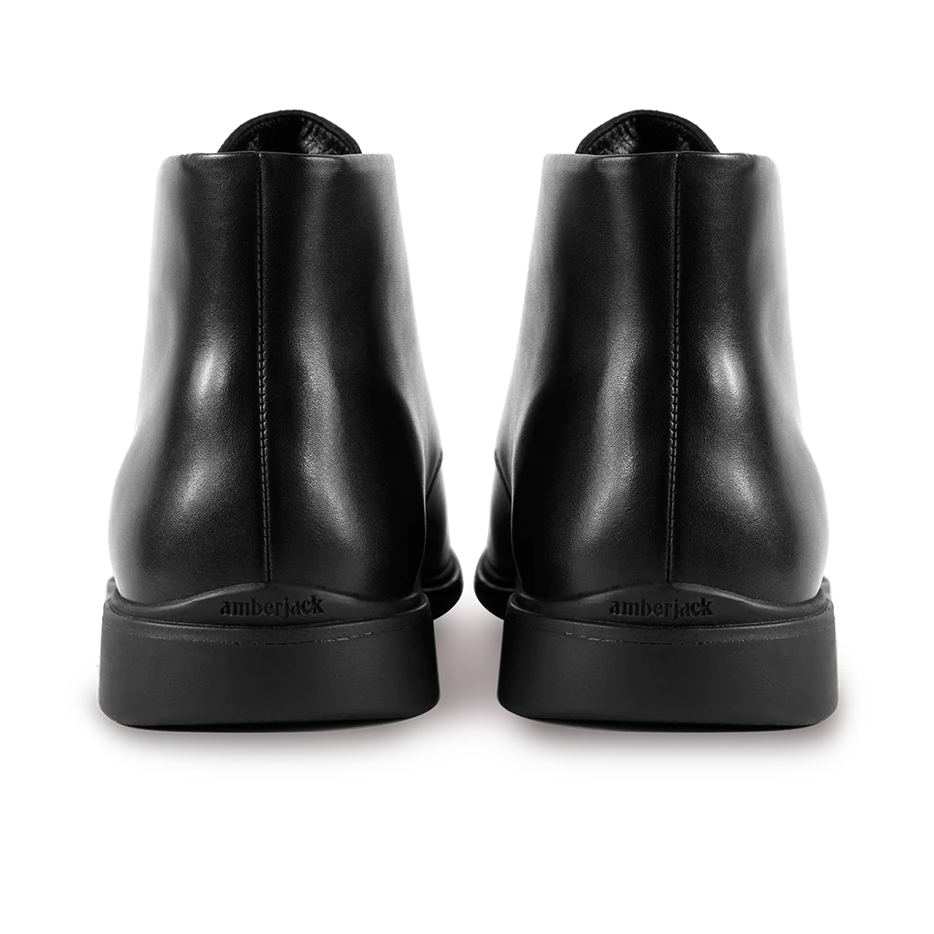Amberjack Chukka Obsidian black pilot mid-cut boot, left side view, two-eyelet lace-up | Back