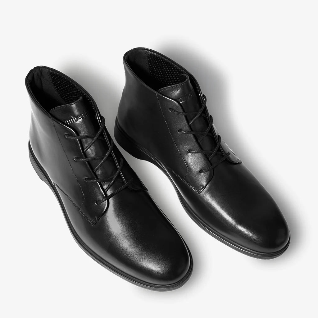 Amberjack Chukka Obsidian black pilot mid-cut boot, left side view, two-eyelet lace-up | Angled Veiw
