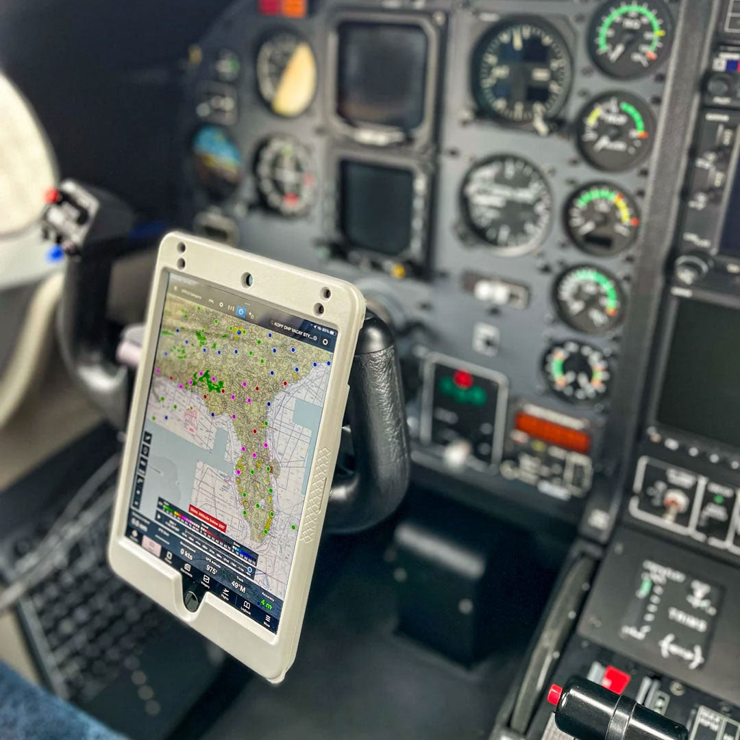 PIVOT Claw Mount securely holding an iPad in an aircraft cockpit for Electronic Flight Bag use