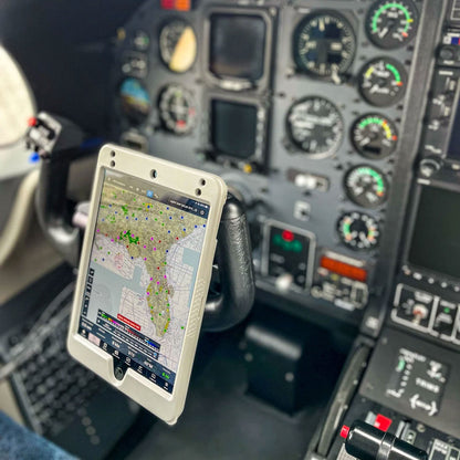 PIVOT Claw Mount securely holding an iPad in an aircraft cockpit for Electronic Flight Bag use