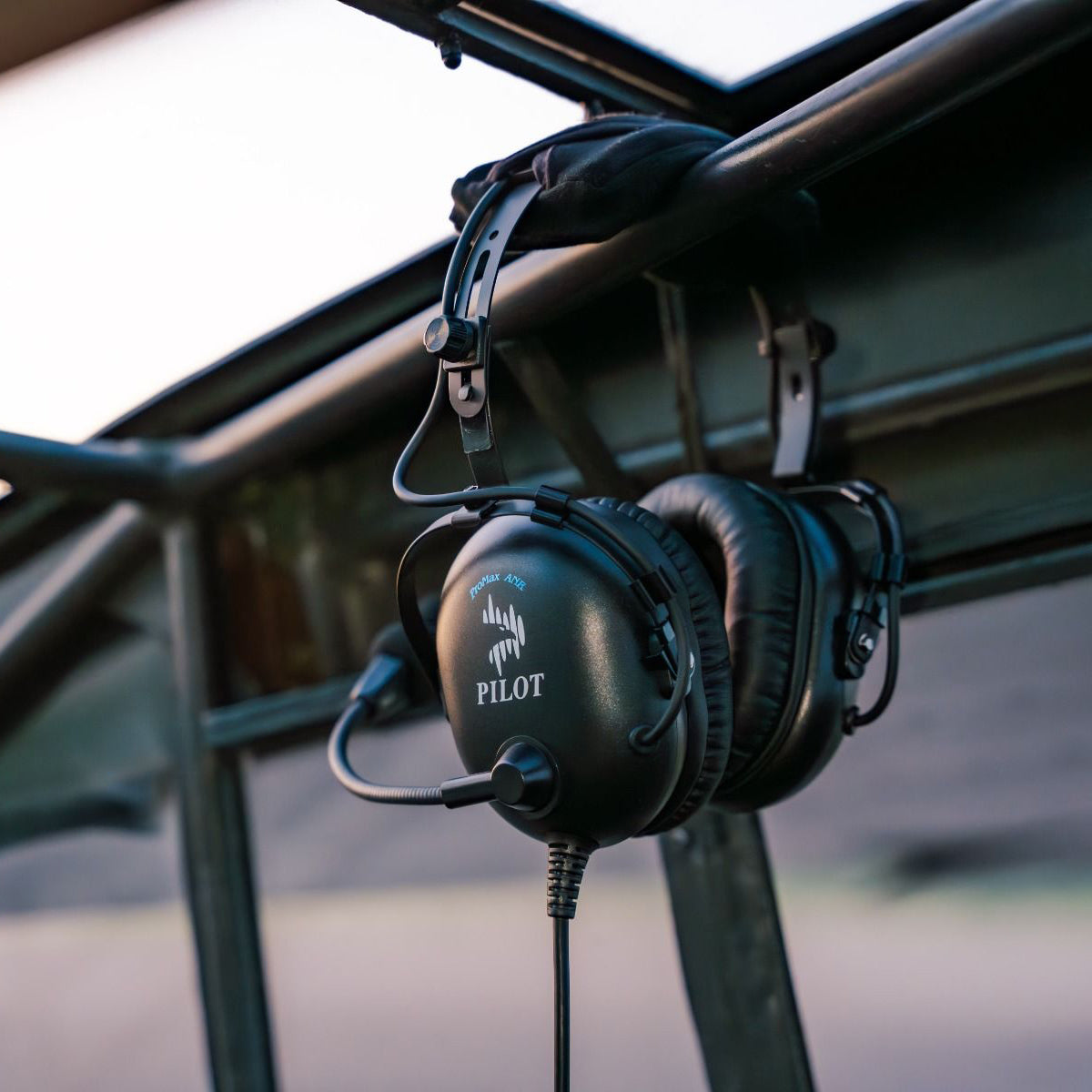 Close-up of Pilot USA ProMax ANR Aviation Headset in aircraft cockpit