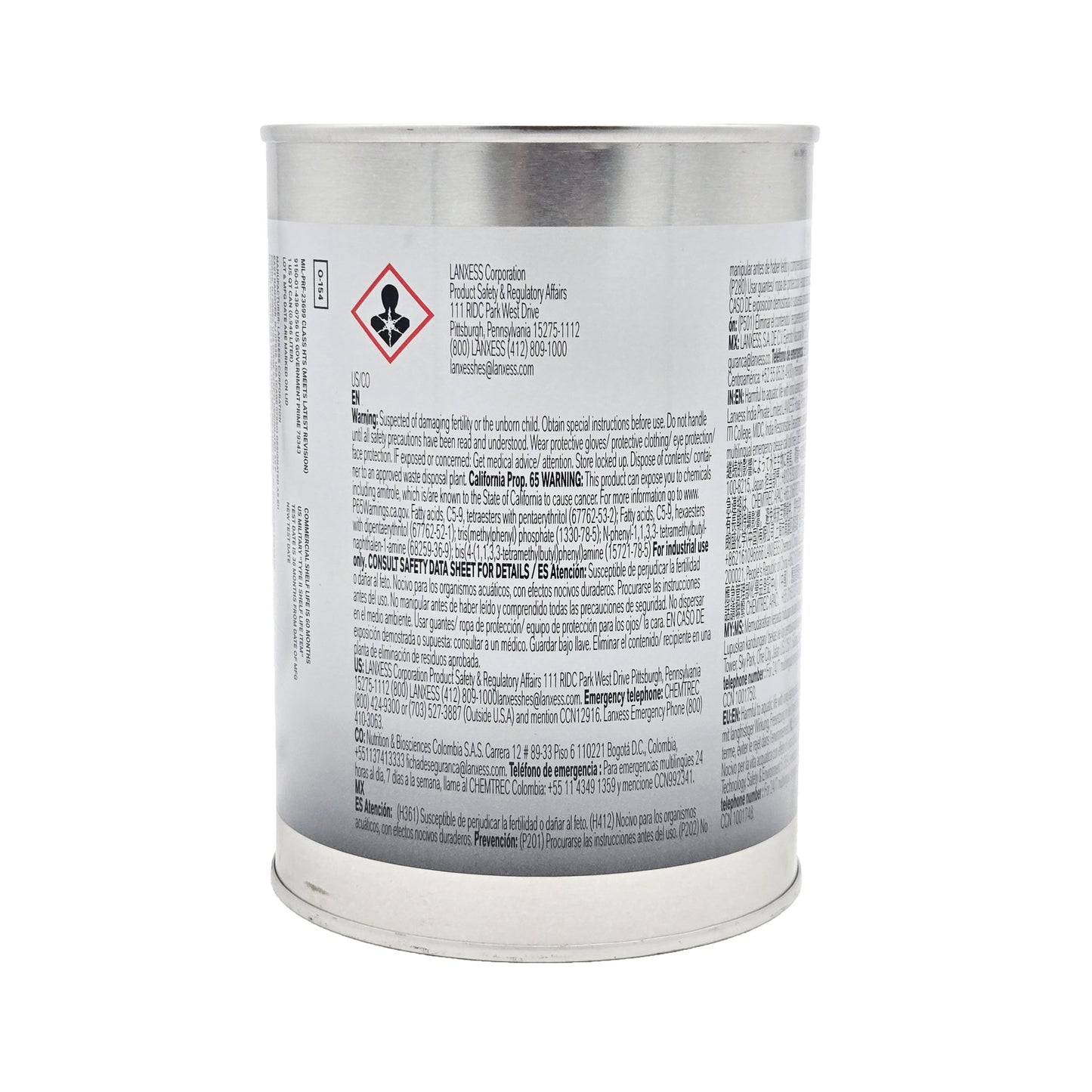 Close-up of Royco 560 turbine engine oil can label with health hazard symbol and detailed safety warnings in English and Spanish