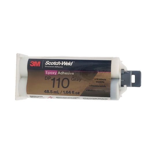 Front view of expired 3M Scotch-Weld DP110 gray epoxy adhesive Duo-Pak cartridge showing 10-minute work life, flexible bonds, and 1.7 oz volume.