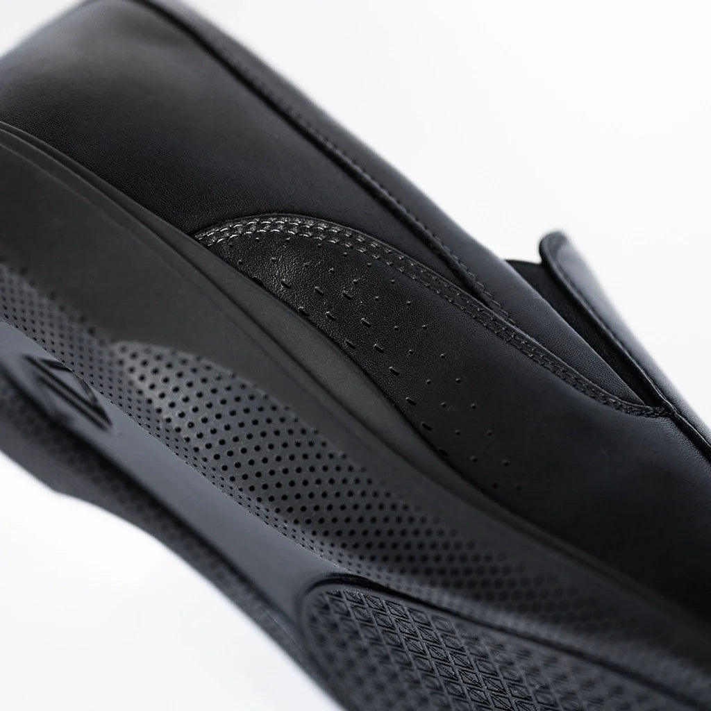 Amberjack Slip-On Obsidian black pilot dress shoe, left side view, laceless aviation shoe | Close up