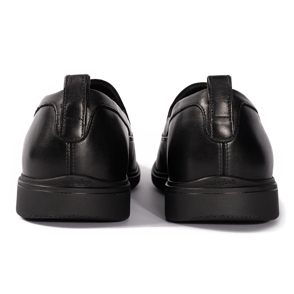 Amberjack Slip-On Obsidian black pilot dress shoe, left side view, laceless aviation shoe  | Back