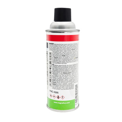 Side label of Magnaflux Spotcheck SKC-S cleaner with NFPA hazard diamond, chemical contents, multilingual safety warnings, and application instructions