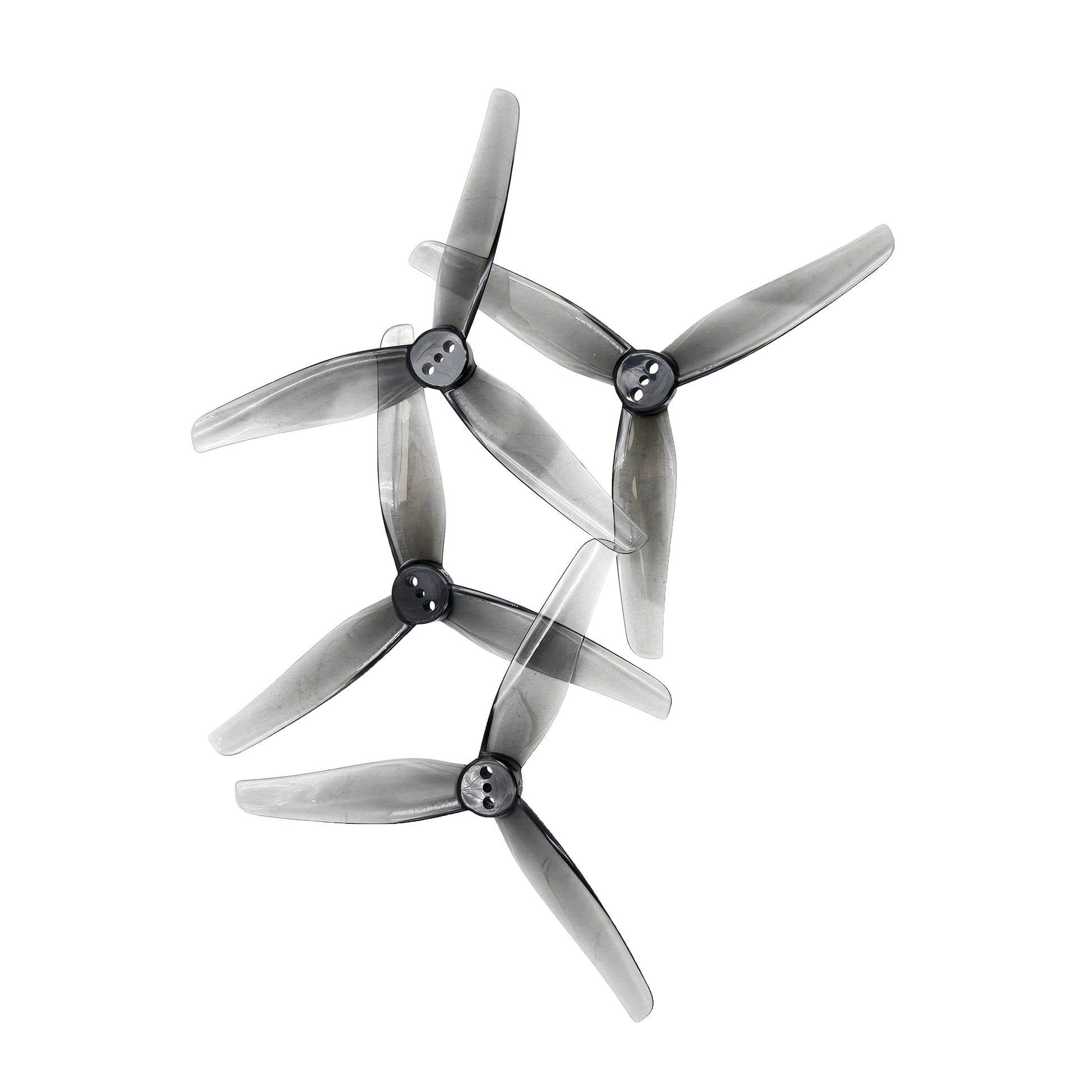 Set of four HQProp T3.5X2.5X3 grey 3-blade drone propellers in semi-transparent polycarbonate arranged on white background