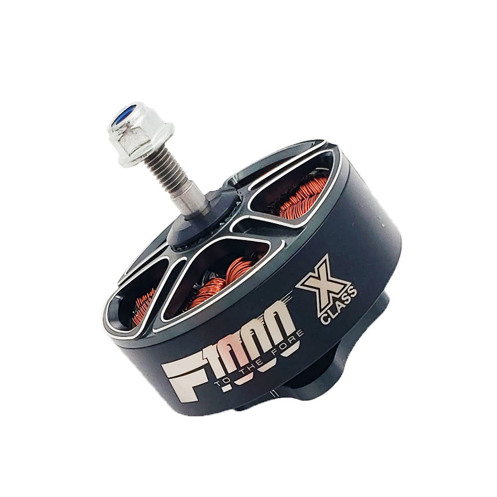 Angled close-up of T-Motor F1000 X Class motor showing threaded shaft, locking nut, cooling vents, and visible copper windings