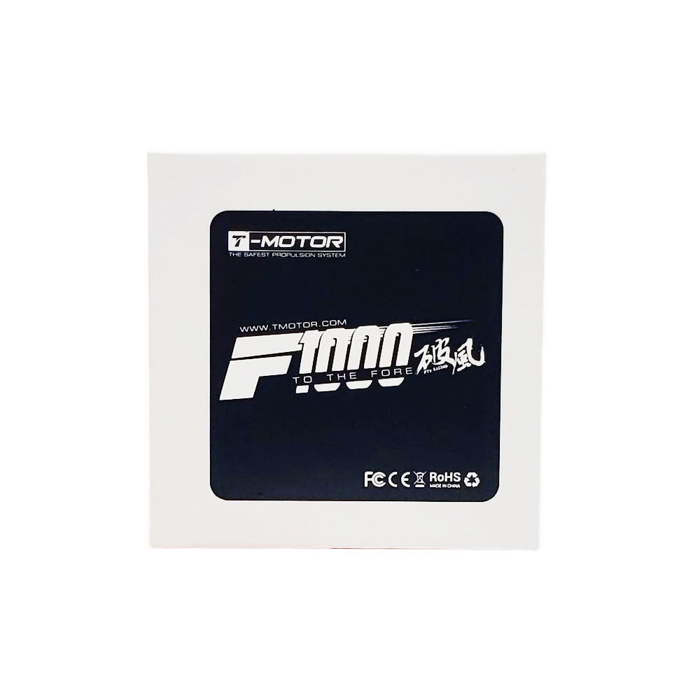 Top-down view of T-Motor F1000 box label showing T-Motor logo, website, and FCC CE RoHS compliance icons.
