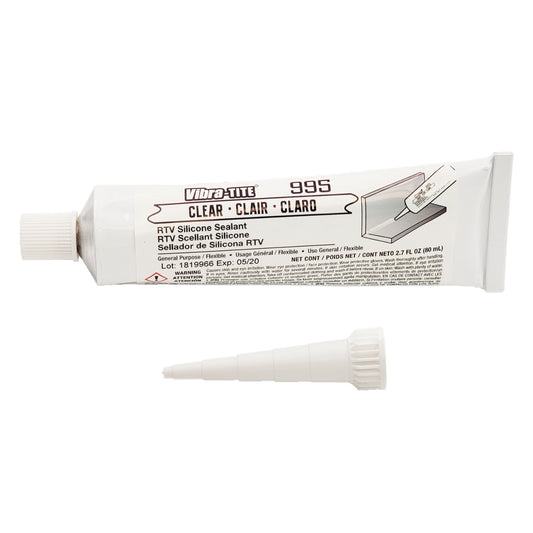 Front view of expired Vibra-Tite 995 clear RTV gasket maker silicone showing general-purpose flexible sealant labeling and corner joint application diagram