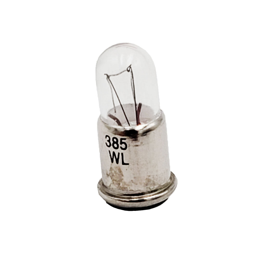Close-up of Wamco 385 subminiature aircraft lamp showing clear T-1 3/4 bulb and midget flange base stamped ‘385 WL