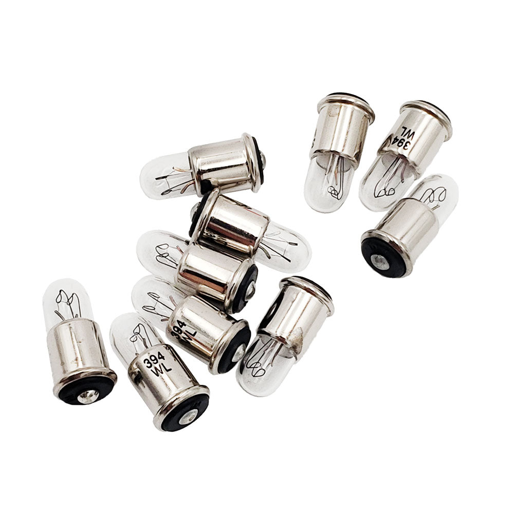 Group of ten Wamco 394 subminiature aircraft lamps showing clear glass bulbs and midget flange bases