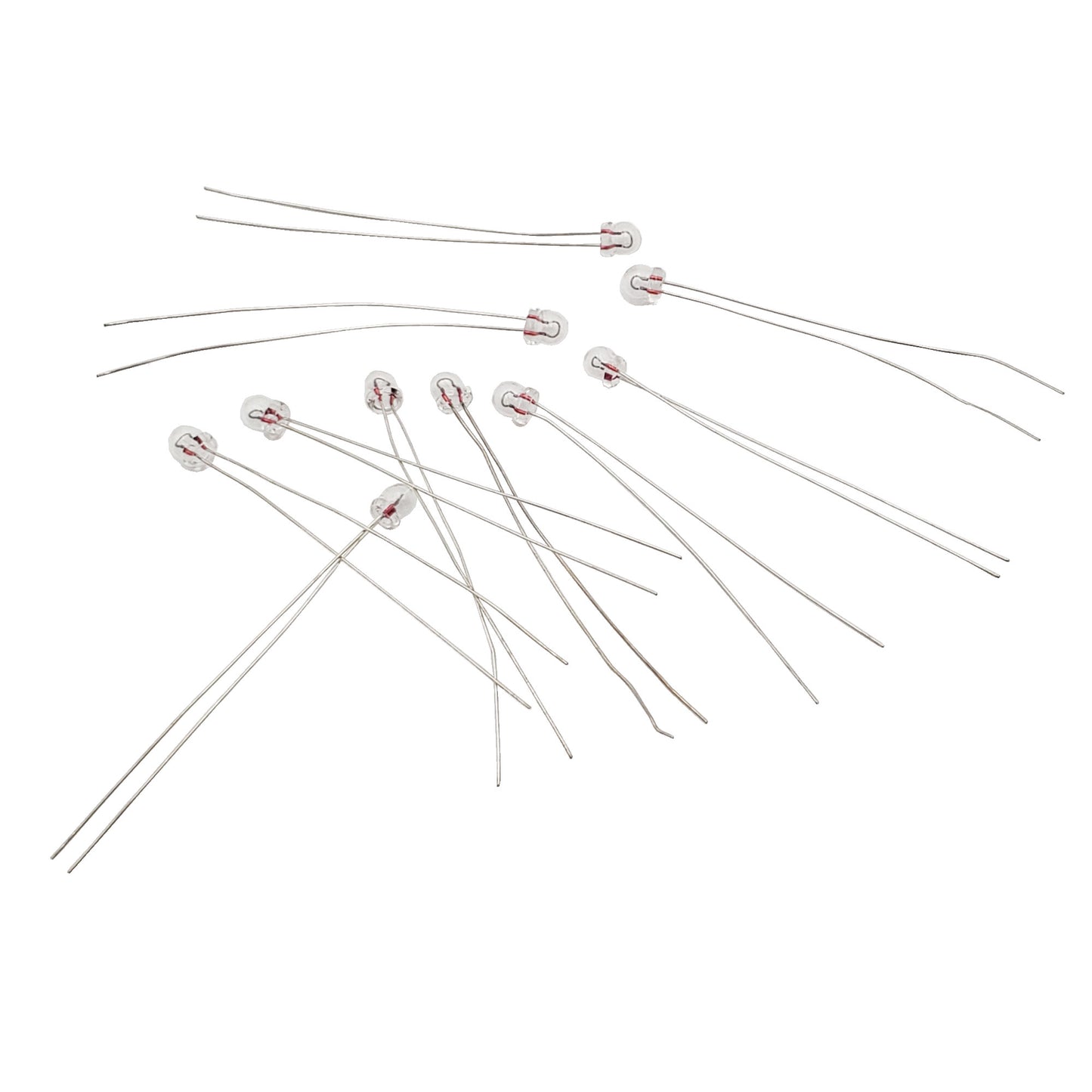 Ten Wamco 7152AS15 subminiature aircraft lamps with wire leads arranged on a white background