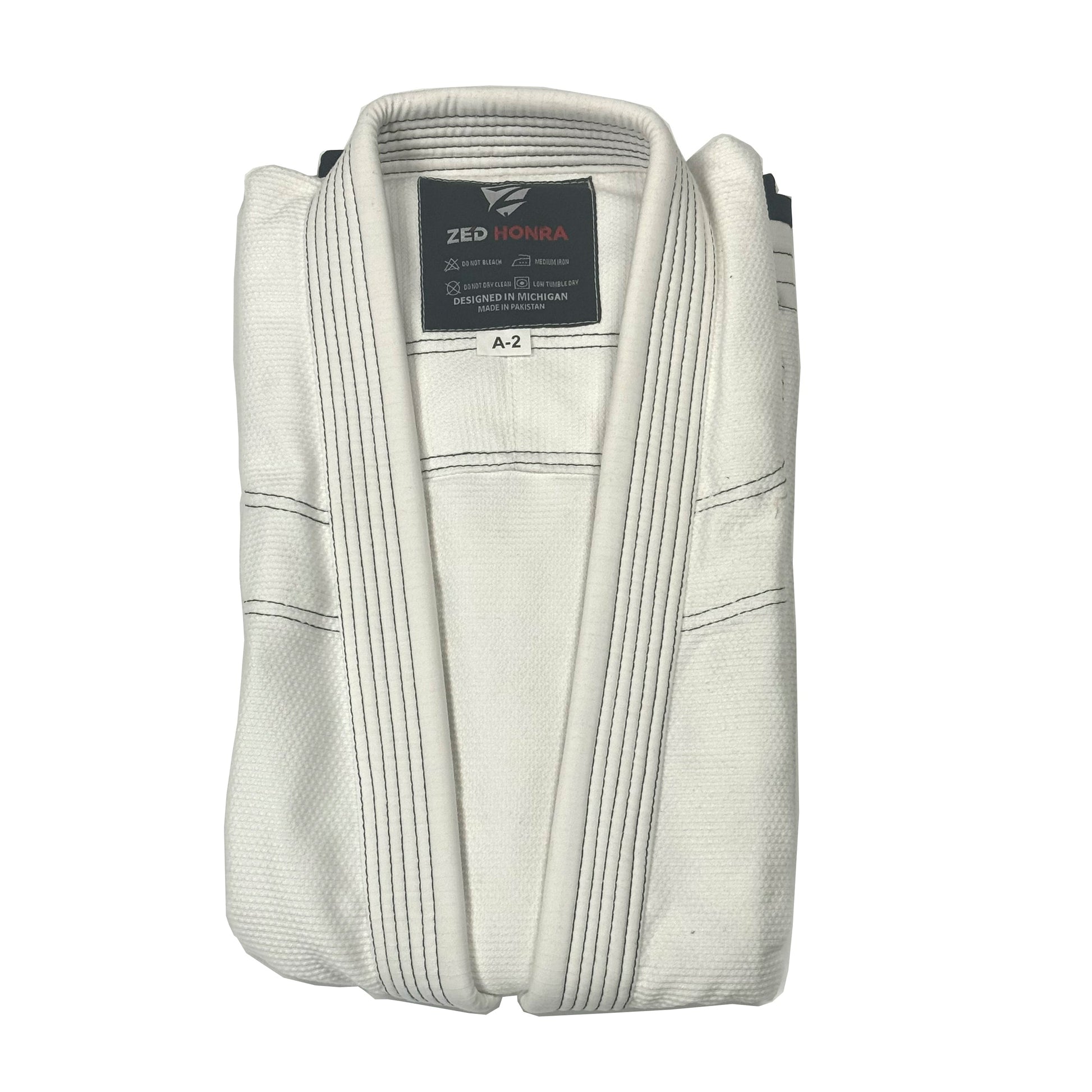 Zed Honra Women’s Alpha Gi – White BJJ Kimono Jacket Folded for Storage or Display