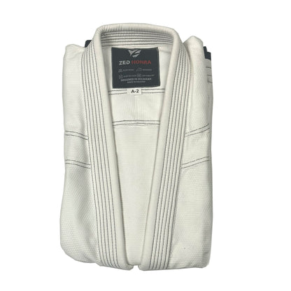 Zed Honra Women’s Alpha Gi – White BJJ Kimono Jacket Folded for Storage or Display