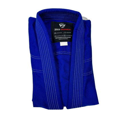 Zed Honra Men’s Alpha Gi – Blue BJJ Kimono Jacket Neatly Folded for Storage or Display