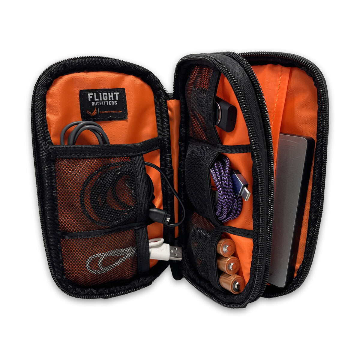 Flight Outfitters Cord Organizer holding charging cables and electronics