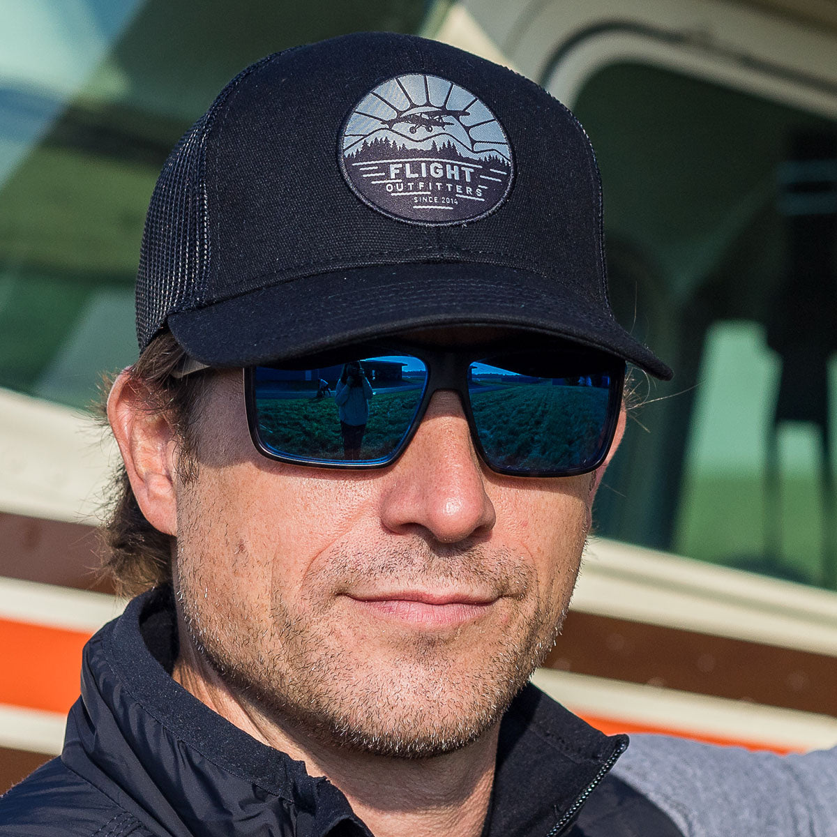 Flight Outfitters Mountain Maverick Hat worn by pilot with sunglasses