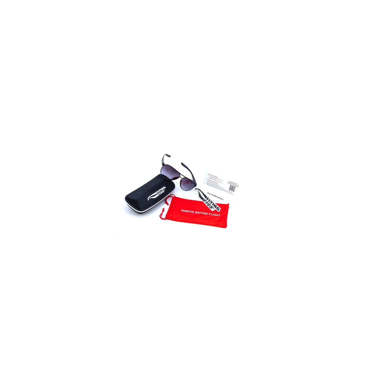 Flying Eyes Remove Before Flight red microfiber eyewear bag shown with sunglasses, hard case and product information card; eyewear not included