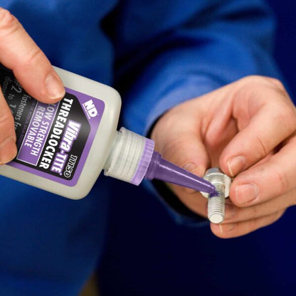 Applying Vibra-Tite 111 Low Strength Removable Threadlocker to screw threads during aircraft maintenance