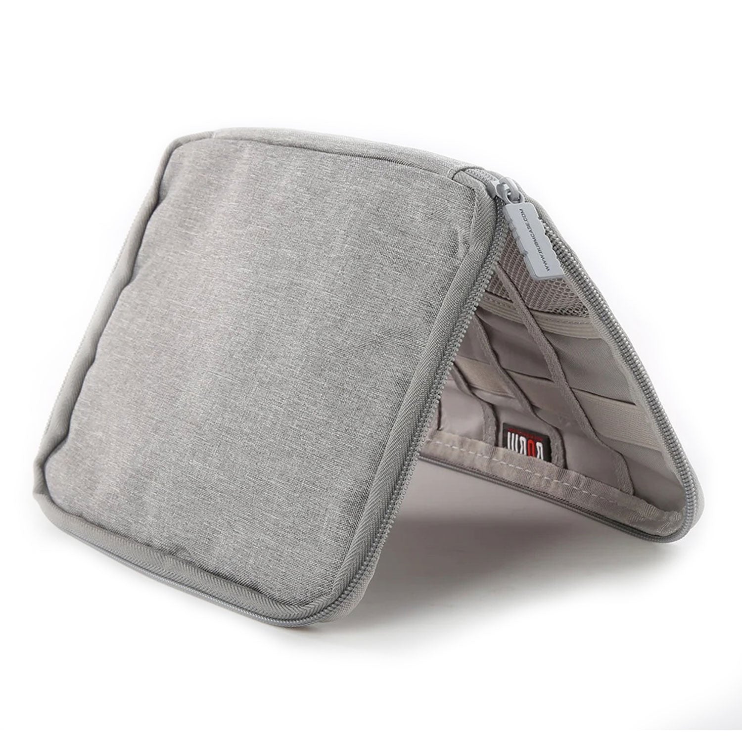 Gray travel watch and strap organizer standing open to reveal interior mesh and elastic