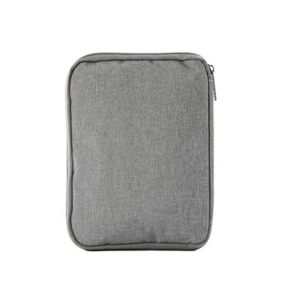 Top view of the travel watch and strap organizer pouch with a minimalist gray fabric exterior.