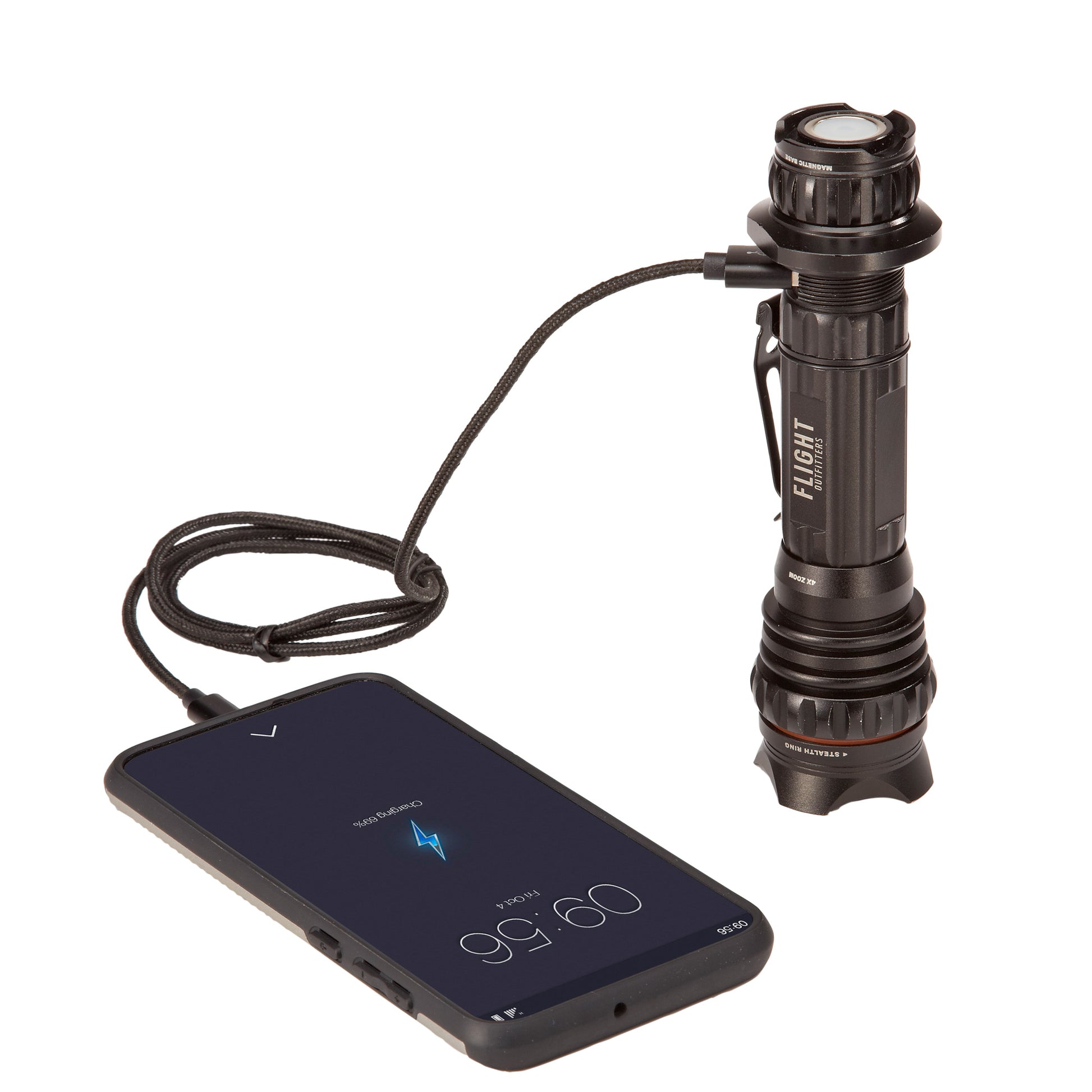 Flight Outfitters Bush Pilot Flashlight showing its USB charging port being used to charge a phone.