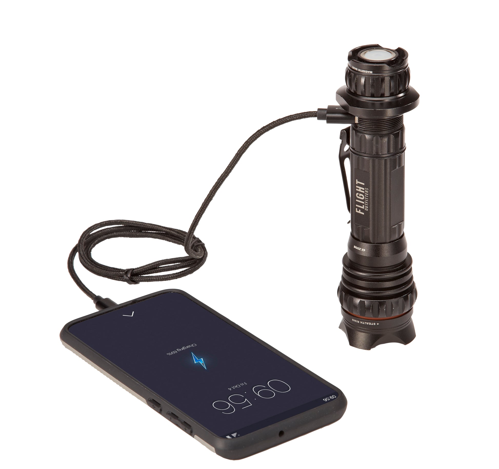 Flight Outfitters Bush Pilot Flashlight showing its USB charging port being used to charge a phone.