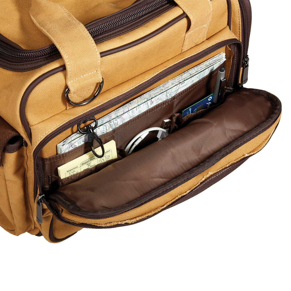 Close-up of the front open pocket of the Flight Outfitters Bush Pilot Flight Bag, showcasing its organized compartments.