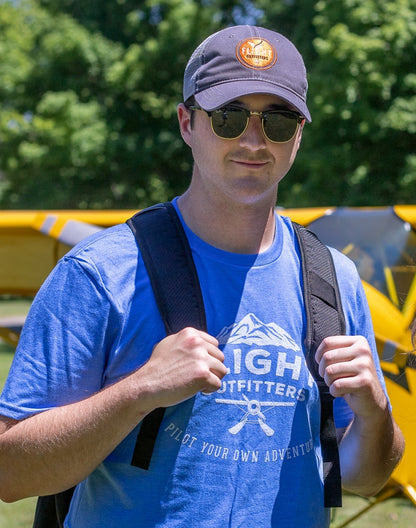 A man wearing the Flight Outfitters Mountain Range T-Shirt, showcasing its comfortable and versatile fit.