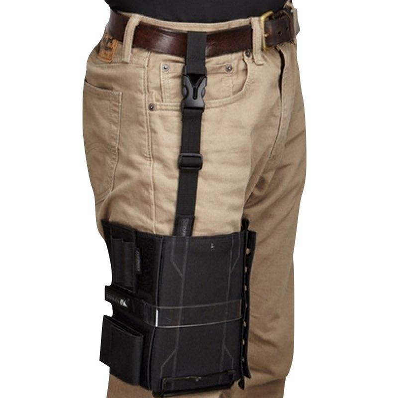 FlyBoys kneeboard leg strap FB3316 in use, securing kneeboard to pilot’s thigh over khaki pants with belt loop attachment