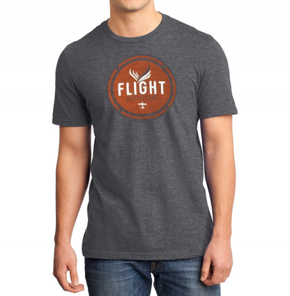 Close-up view of a man wearing the Flight Outfitters Retro T-Shirt, emphasizing the soft fabric and classic logo detail.