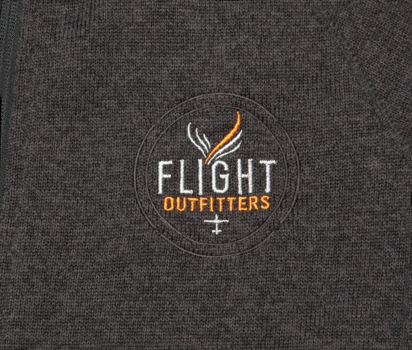Detailed view of the Flight Outfitters logo embroidered on the Men’s Fairbanks Fleece.