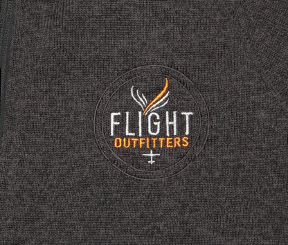 Detailed view of the Flight Outfitters logo embroidered on the Men’s Fairbanks Fleece.