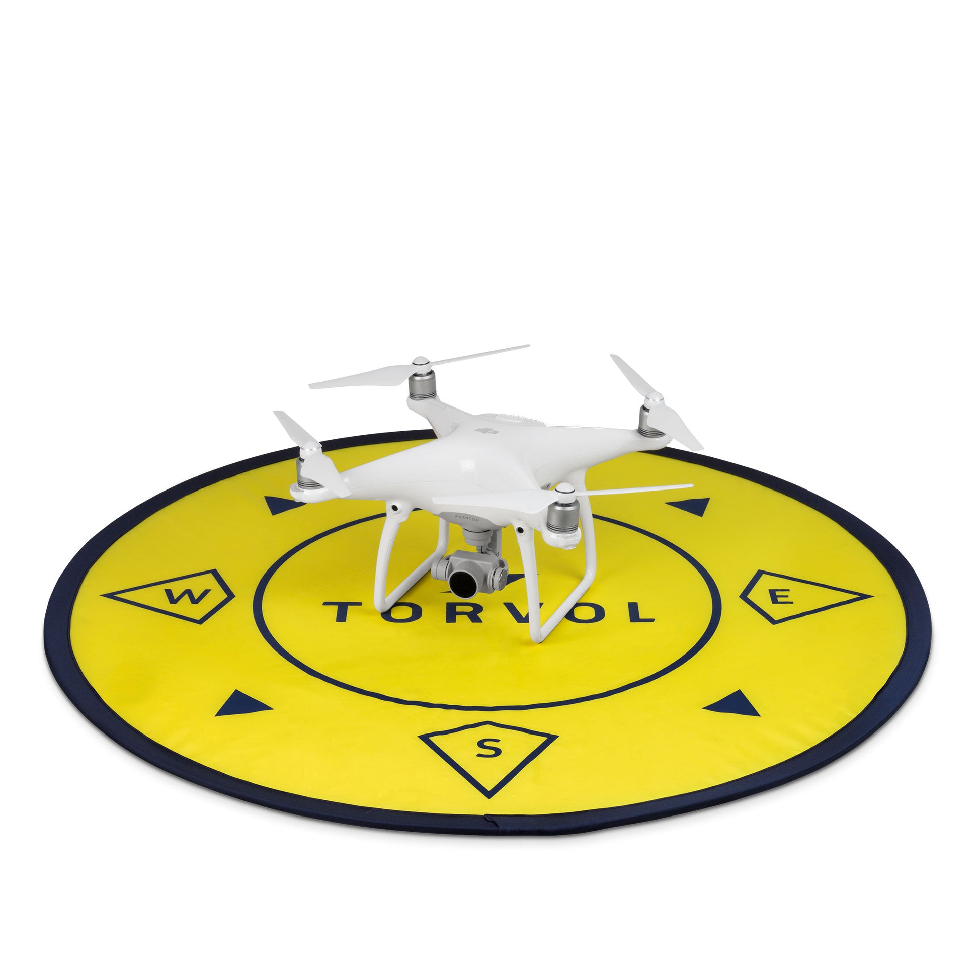 Torvol Drone Landing Pad – Yellow and Black Circular Pad with Compass Arrows, White Model Drone Displayed